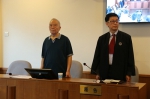 一审时，季承（左）在法庭上。北京一中院供图 - 山东华网