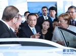 李克强与德国总理默克尔共同出席中德自动驾驶汽车展示活动 - 中国山东网