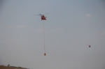 应急管理部森林消防局直升机支队飞行二大队开展灭火训练。（徐辉 摄） - 中国山东网